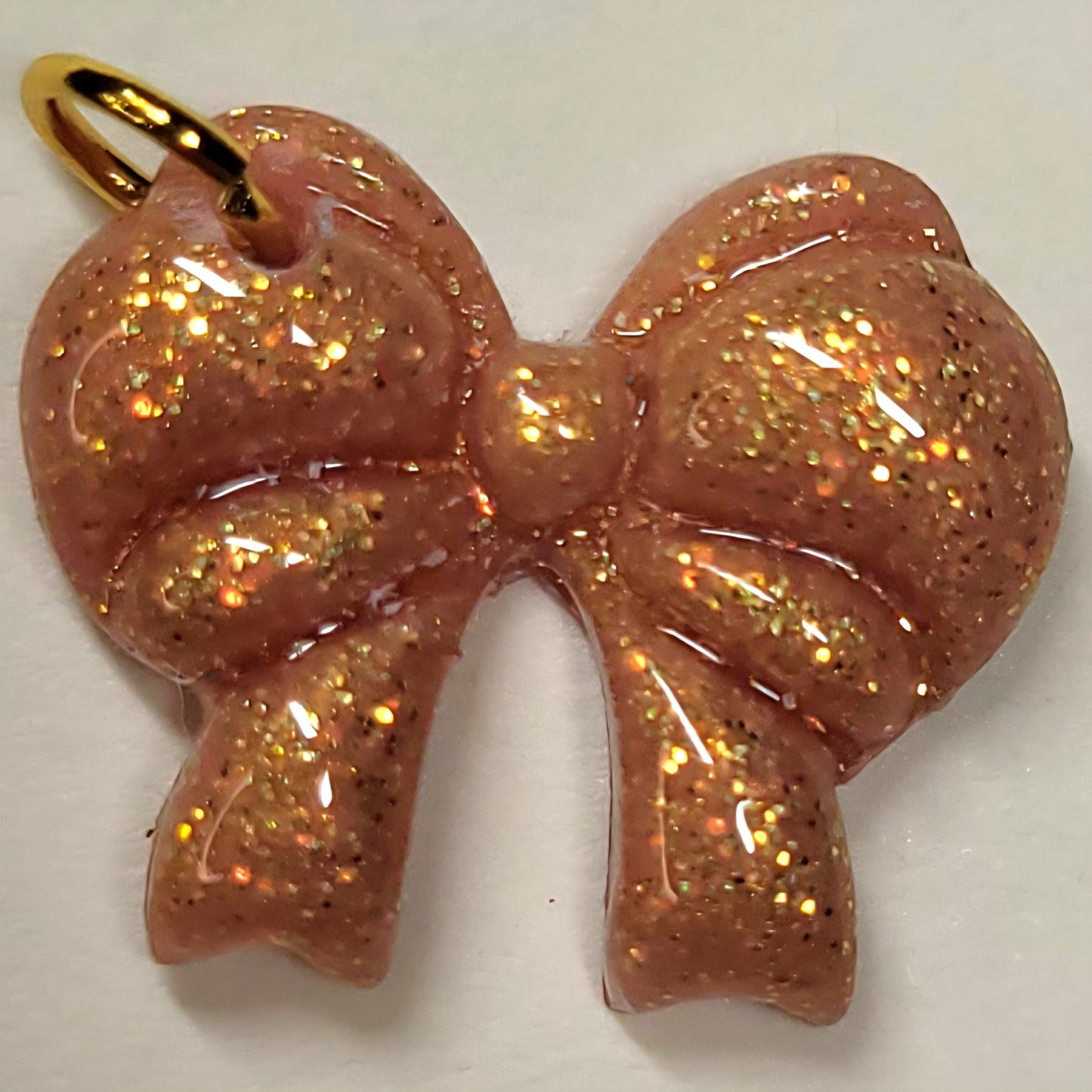 Nœud doré paillette